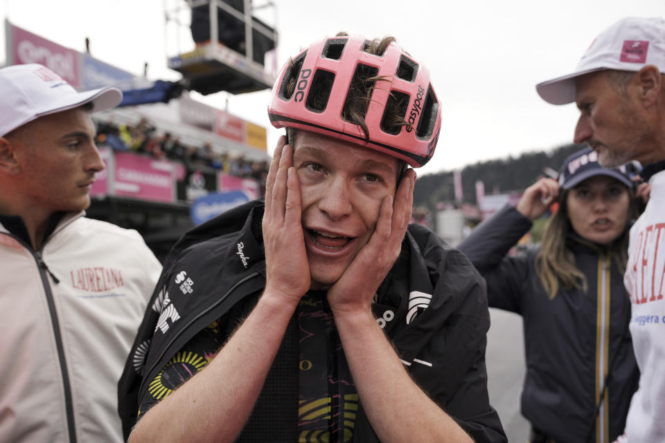 Georg Steinhauser reacts after winning the 17th stage of the Giro d'Italia from Selva di Val Gardena to Passo Brocon, Italy, Wednesday, May 22, 2024. (Marco Alpozzi/LaPresse via AP)