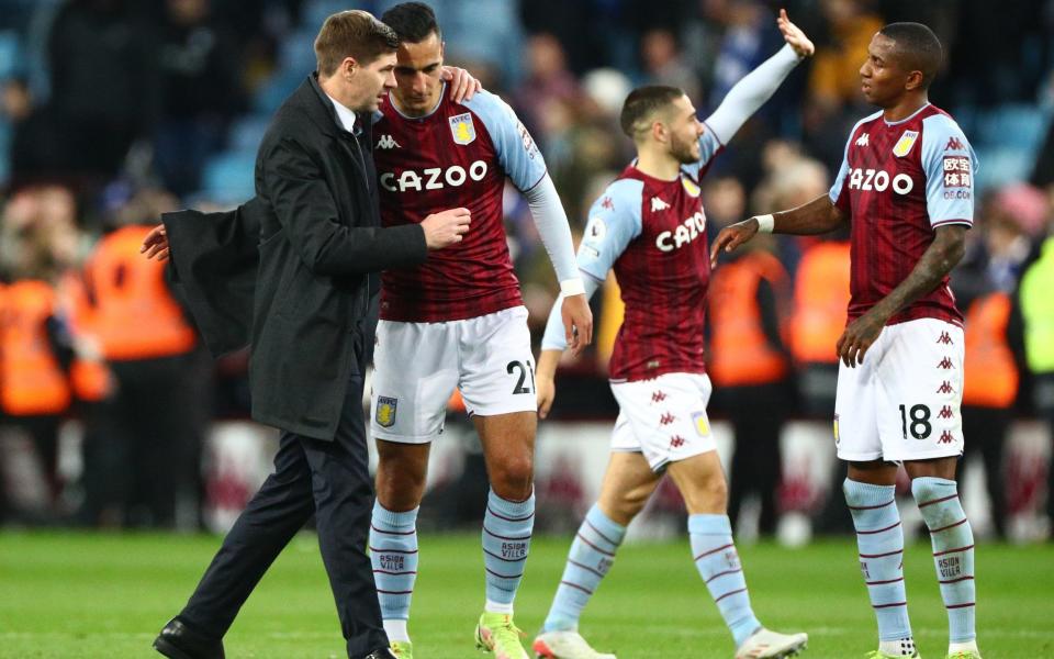 Steven Gerrard celebrates with Anwar El Ghazi at full time - REUTERS