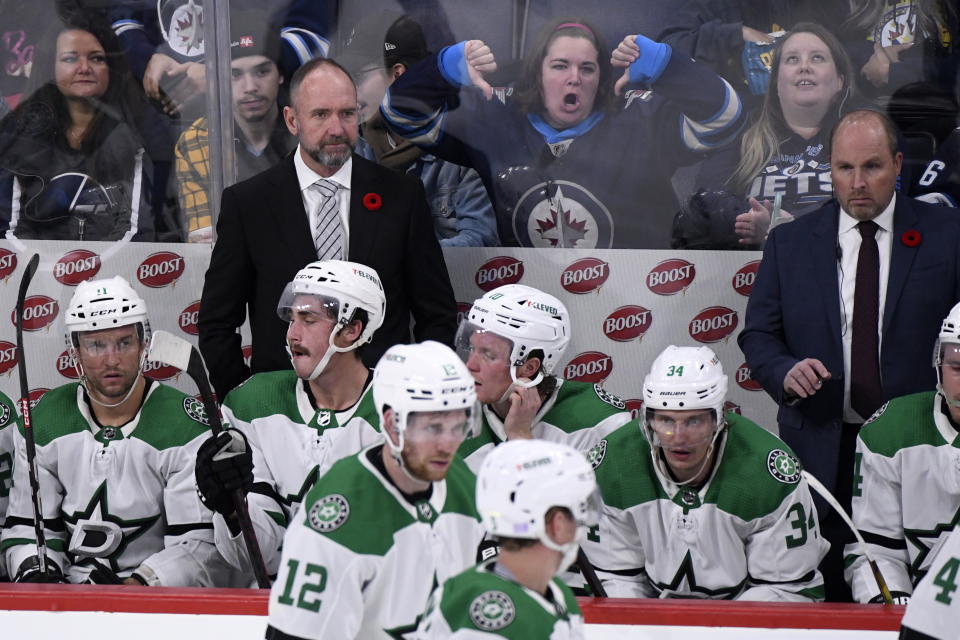 Dallas Stars' head coach Peter DeBoer watches the action against the Winnipeg Jets during the third period of an NHL hockey game, Tuesday, Nov. 8, 2022 in Winnipeg, Manitoba. (Fred Greenslade/The Canadian Press via AP)