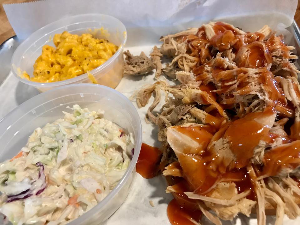 Dinners, like this chopped whole hog dinner, came with two sides at Atwood Hwy BBQ in South Milwaukee. The restaurant made its own sides, such as this mac and cheese and coleslaw.