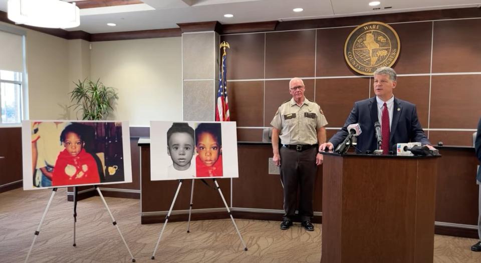 GBI Special Agent in Charge Jason Seacrist (right) and Ware County Sheriff Carl James (middle) announce that a 