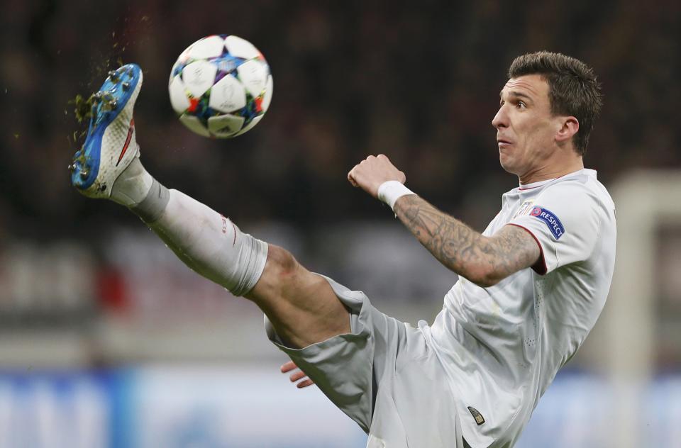 Atletico Madrid's Mandzukic controls the ball during Champions League soccer match against Bayer Leverkusen in Leverkusen