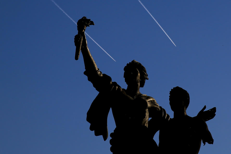 Israeli warplanes fly behind the Statue of Martyrs in Martyrs Square in downtown Beirut, Lebanon, Monday, Oct. 29, 2018. (AP Photo/Hassan Ammar)