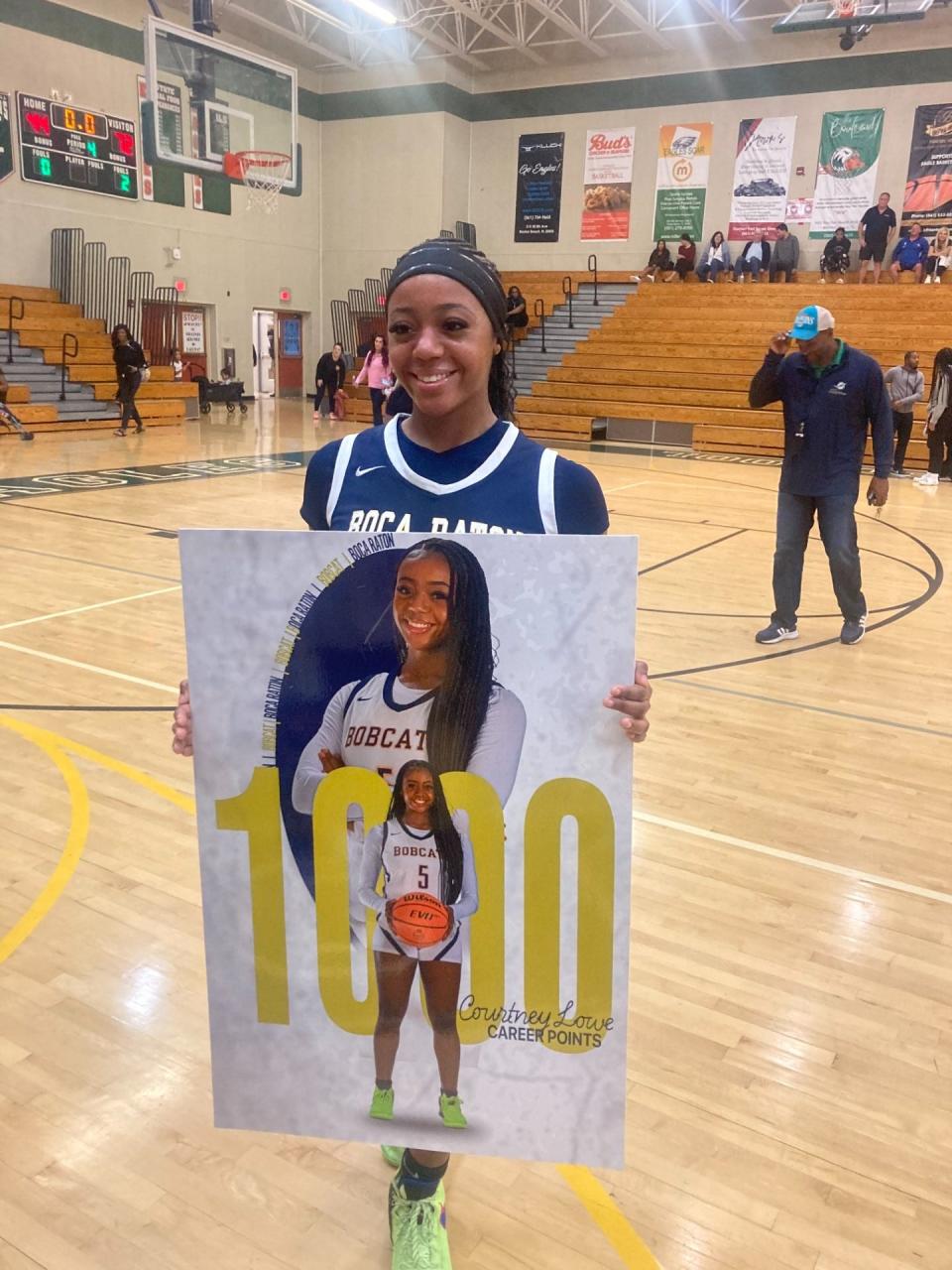 Boca Raton senior Courtney Lowe celebrated a milestone by eclipsing 1,000 career points in the Bobcats' game against Atlantic on Jan. 11, 2024 in Delray Beach.