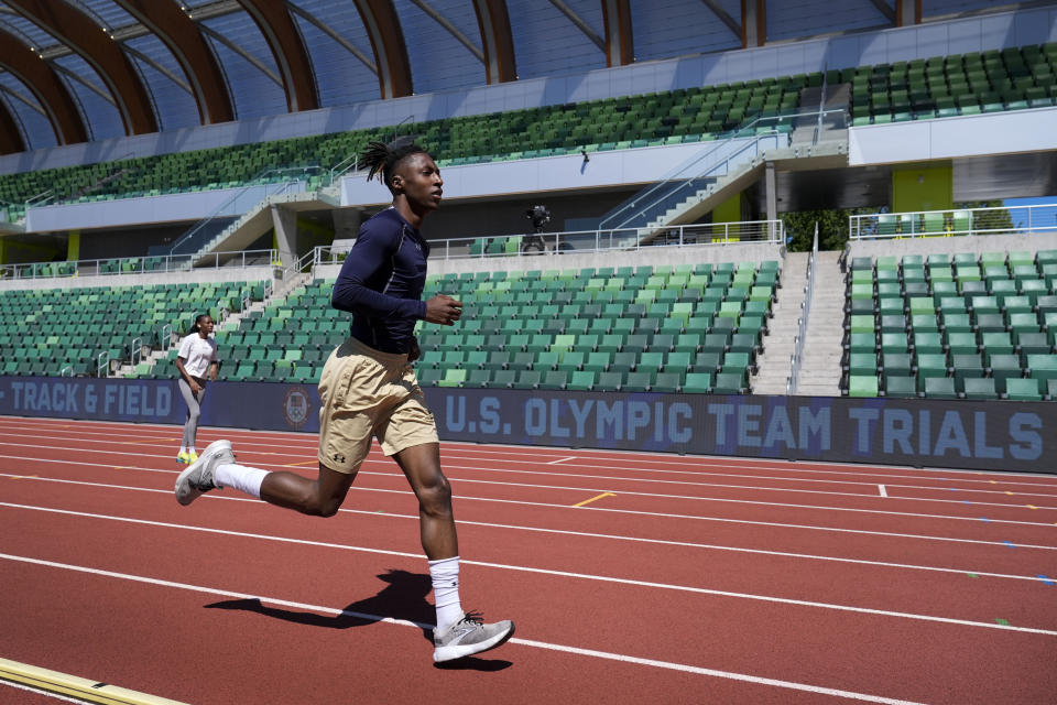 HOLD FOR STORY- Eric Gregory runs on the track at the U.S. Olympic Track and Field Trials, Wednesday, June 19, 2024, in Eugene, Oregon. The deaf sprinter from Gallaudet University in Washington, D.C., earned the last spot into the 400-meter field at the U.S. Olympic Trials this week. (AP Photo/Charlie Neibergall)