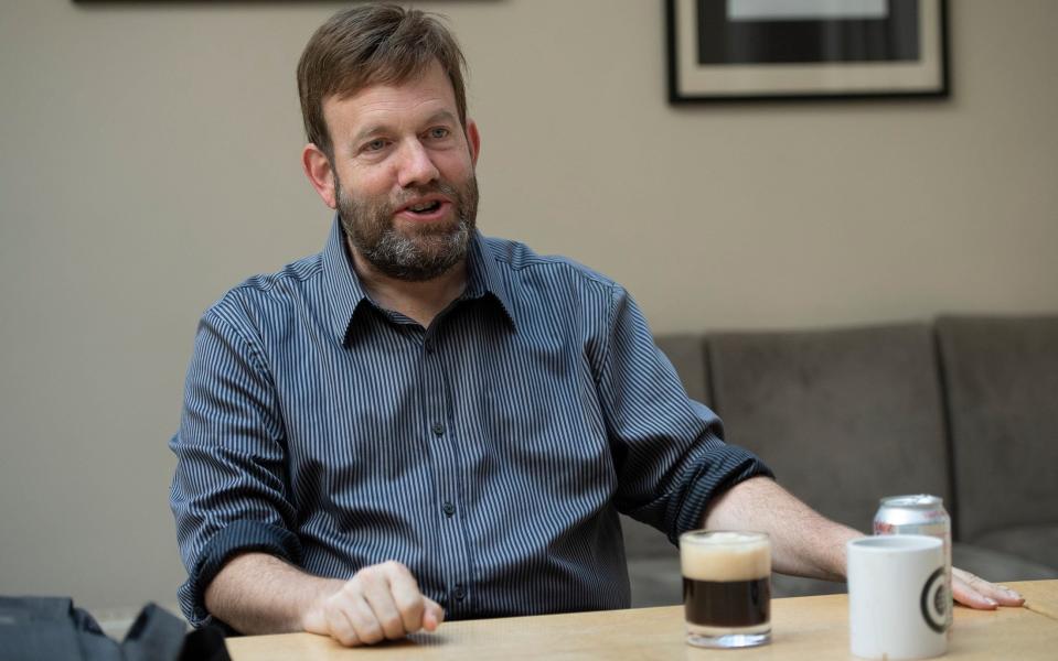 Dr Luntz's work is fuelled by a cocktail of instant coffee and Diet Coke - Eddie Mulholland