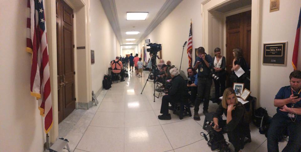 Journalists crowd outside of Rep. Brian Babin's office waiting for lawmakers on the House Judiciary Committee, which was meeting with former White House aide Hope Hicks on Wednesday.