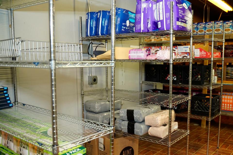 Empty shelves at the City of Refuge Ministries Meal Assistance Program in Tecumseh are pictured Friday, Feb. 17. "We distribute quite a large number of pounds monthly and need to acquire large quantities of food monthly to keep up with demand,' said De’Angelo Boone, director of the City of Refuge Ministries Meal Assistance Program.