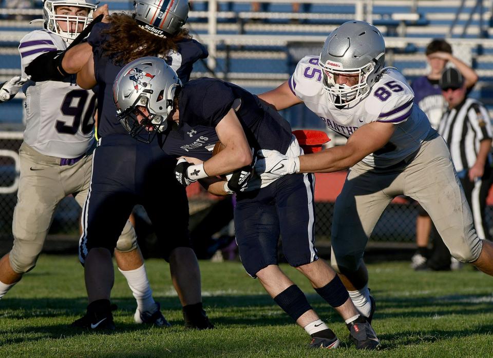 Bloomington South's defensive lineman Tysen Smith doesn't let Terre Haute North's Ethan Tabor get very far on a carry during the Panthers' 66-0 win over the host Patriots on Friday in Terre Haute.