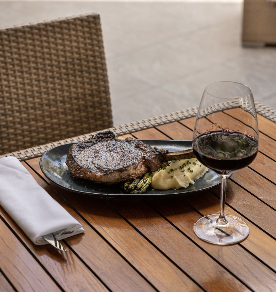 Let dad get his spurs janglin' for this 24-ounce cowboy steak at the Seagate Hotel & Spa in Delray Beach. It includes potato puree and asparagus.