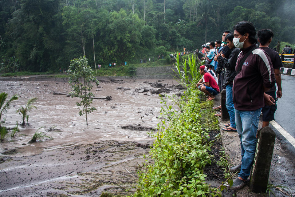 The damage from cold lava flows&nbsp;is&nbsp;worsened by rainfall Tuesday on Bali. (Photo: Muhammad Fauzy/NurPhoto via Getty Images)