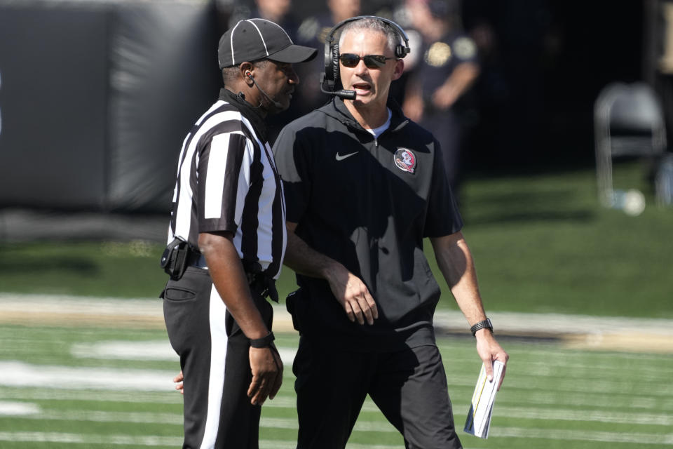 Florida State head coach Mike Norvell argues a call during the first half of an NCAA college football game against Wake Forest in Winston-Salem, N.C., Saturday, Oct. 28, 2023. (AP Photo/Chuck Burton)