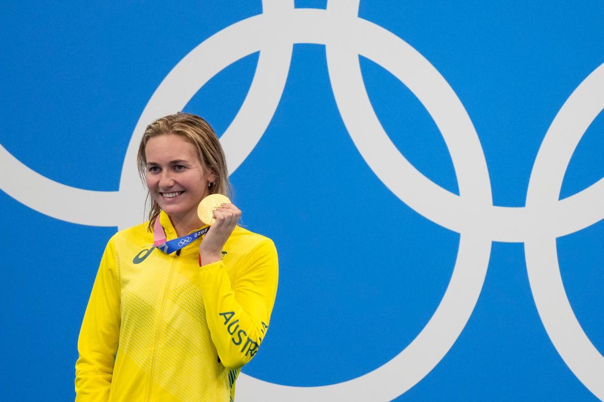 Ariarne Titmus celebrates winning 200m freestyle gold (AP)