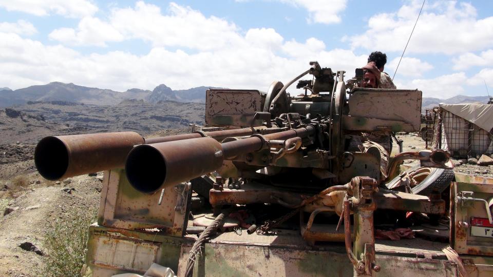 Southern People's Resistance militant loyal to Yemen's President Abd-Rabbu Mansour Hadi mans an anti-aircraft machine gun the militia seized from the army in al-Habilin of Yemen's southern province of Lahej