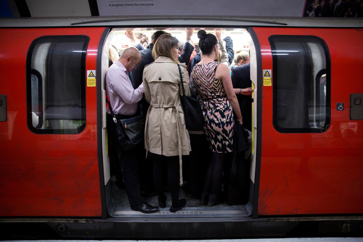 Tube passengers advised the curious tourist not to lean against the pole