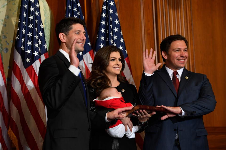 U.S. Rep. Ron DeSantis, right, is sworn into the 115th Congress on Jan. 3, 2017. His wife Casey, daughter Madison and House Speaker Paul Ryan joined him.