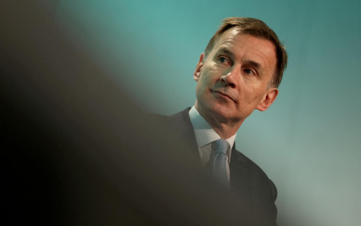 Jeremy Hunt is scaling back plans for tax cuts after it was announced that the UK economy is now technically in a recession