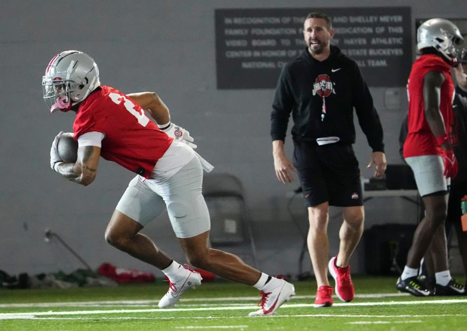 Mar 5, 2024; Columbus, OH, USA; Ohio State Buckeyes wide receiver Emeka Egbuka (2) catches a pass during the first spring practice at the Woody Hayes Athletic Center.