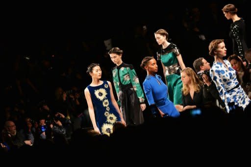 Models walk the runway at the Carolina Herrera Fall 2013 fashion show, on February 11, 2013, in New York. Herrera's fur-lined autumn-winter collection brought elegant warmth to New York Fashion Week