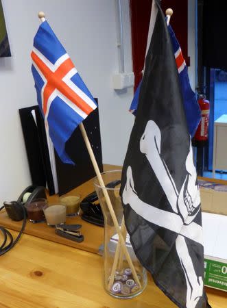 Jolly Rogers pirate flag and Icelandic flags are seen at the Icelandic Pirate Party’s headquarters in Reykjavik, Iceland, September 19, 2016. Picture taken September 19, 2016. REUTERS/Stine Jacobsen