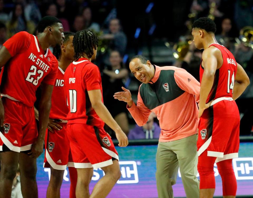 N.C. State head coach Kevin Keatts speaks with his team during the first half of the Wolfpack’s game against Wake Forest on Saturday, Feb. 10, 2024, at Lawrence Joel Veterans Memorial Coliseum in Winston-Salem, N.C. Kaitlin McKeown/kmckeown@newsobserver.com