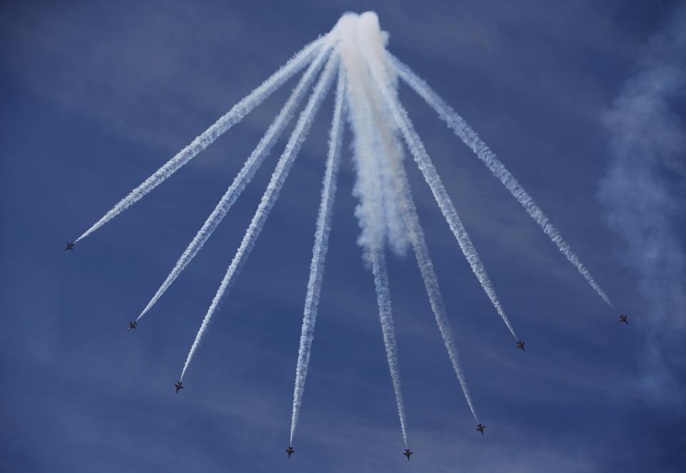 The Black Eagles South Korean airforce aerobatic team perform manoeuvres during celebrations to mark the 65th anniversary of Korea Armed Forces Day, at a military airport in Seongnam, south of Seoul, October 1, 2013. (REUTERS/Kim Hong-Ji)