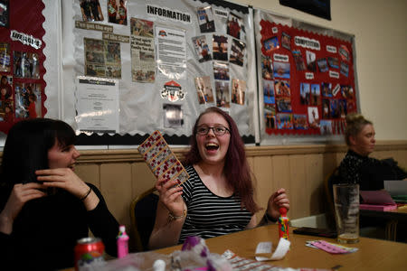 Dana Marie Ovington, 18, plays Bingo at Coronation Hall in Skegness, Britain March 3, 2019. "It's been going downhill for a long time," said Dana of the town, adding she would have voted to leave the EU if she had been old enough. She is studying biology, sociology and health and social care at school, and works part time in a Burger King. "Obviously it's seasonal, so in the summer it's really really good, but during the winter it's terrible." REUTERS/Clodagh Kilcoyne/Files