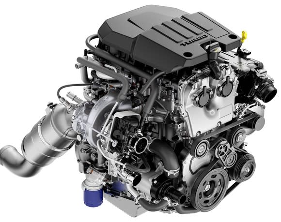 A tightly-packaged four-cylinder engine, with all accessories mounted.