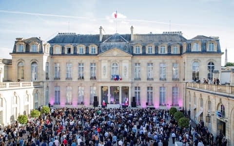 DJ Chloe plays music during the 'Fete de la Musique', the music day celebration in the courtyard of the Elysee Palace, in Paris - Credit: Reuters