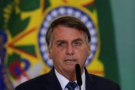 Brazil's President Jair Bolsonaro speaks during a ceremony to launch a program to help new mayors, at Planalto Palace in Brasilia