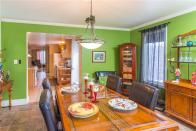 <p>From the dining room, you can see through the kitchen and into the family room. </p>