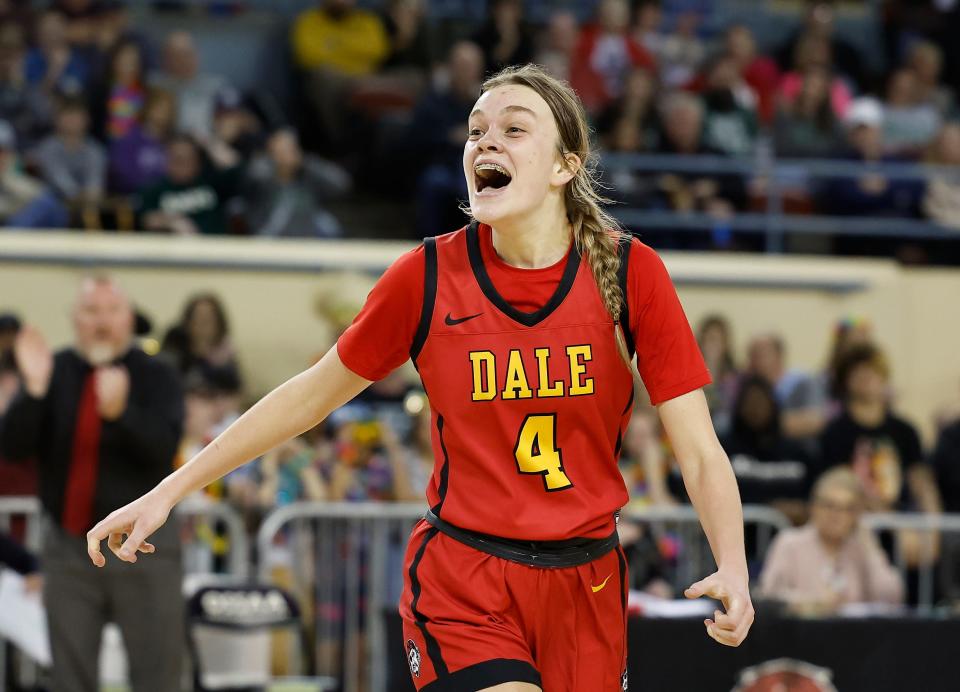 Dale's Ava Bell celebrates during a 52-47 win against Amber-Pocasset on Friday in the Class 2A girls basketball state semifinals at State Fair Arena.