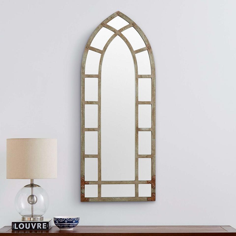 Stone & Beam Modern Arc Metal Frame Hanging Wall Mirror. (Photo: Amazon)