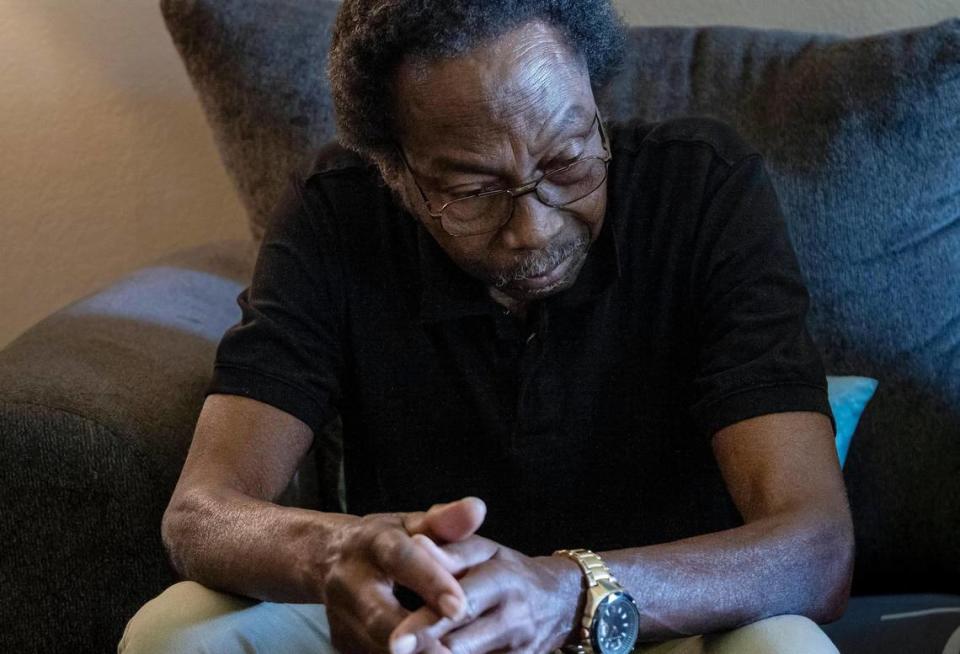 Rufus Jefferson, Reginald Payne’s stepfather, listens as family members speak about his son on earlier this month at their home in Foothill Farms. Payne died in 2020 after Sacramento police restrained him in a dangerous position as he suffered a medical emergency, according to city documents.