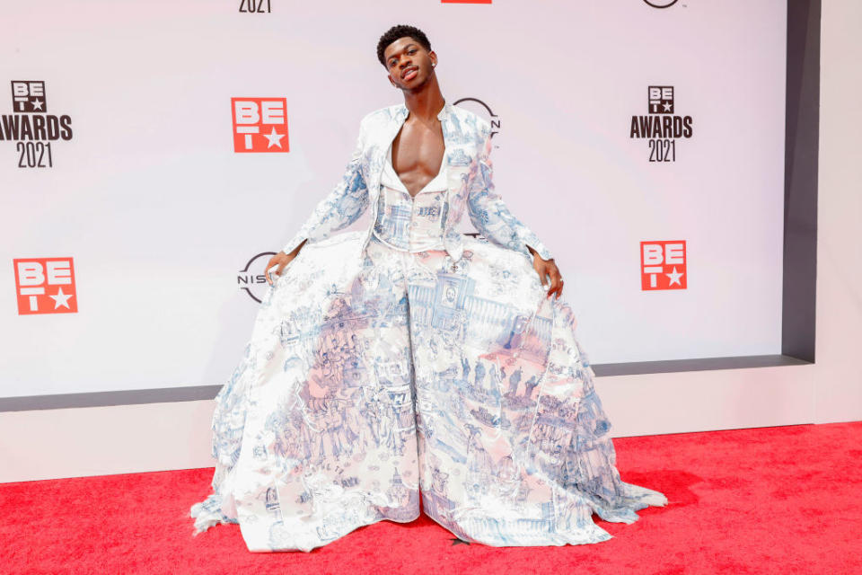 Lil Nas X attends the BET Awards 2021 in a patterned, voluminous outfit with a jacket top