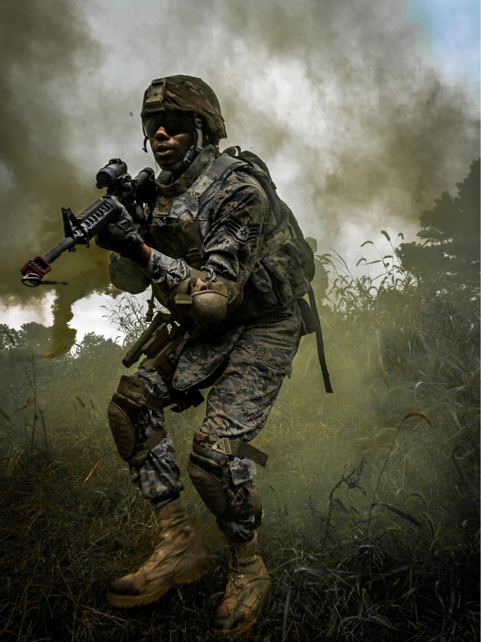 Staff Sgt. Ernest Andrews participates in Combat Skills Training at Joint Base McGuire-Dix Lakehurst, New Jersey, in preparation of an upcoming deployment. The exercise is used to provide Airmen the skills necessary to adminster life saving treatment while under fire (Kenneth Bricker/USAF/Rex Features)