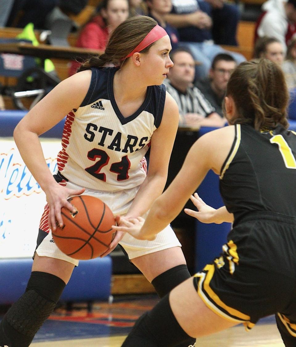 BNL senior Carlee Kern looks for a teammate Tuesday night at BNL Fieldhouse. Kern had seven rebounds and five steals on Senior Night.