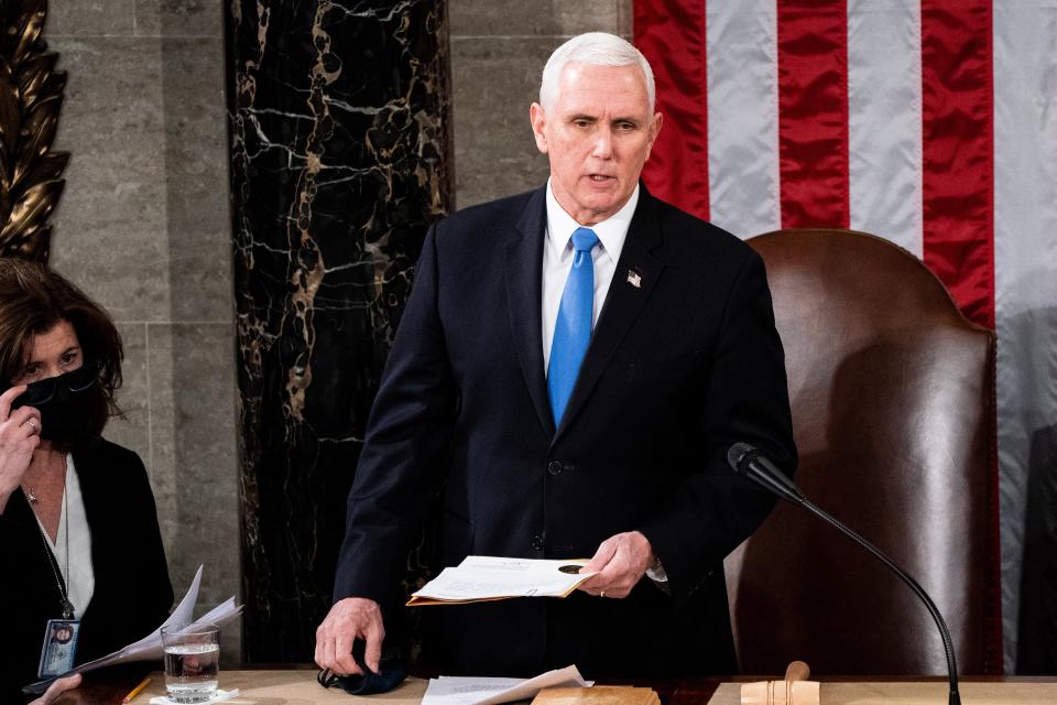 FILE -- Vice President Mike Pence presides as a joint session of Congress convenes to certify the Electoral College vote on Wednesday, Jan. 6, 2021. Pence privately pushed the false claim that ArizonaÕs election results were wrong and asked whether there was any way he could delay certification. (Erin Schaff/The New York Times)