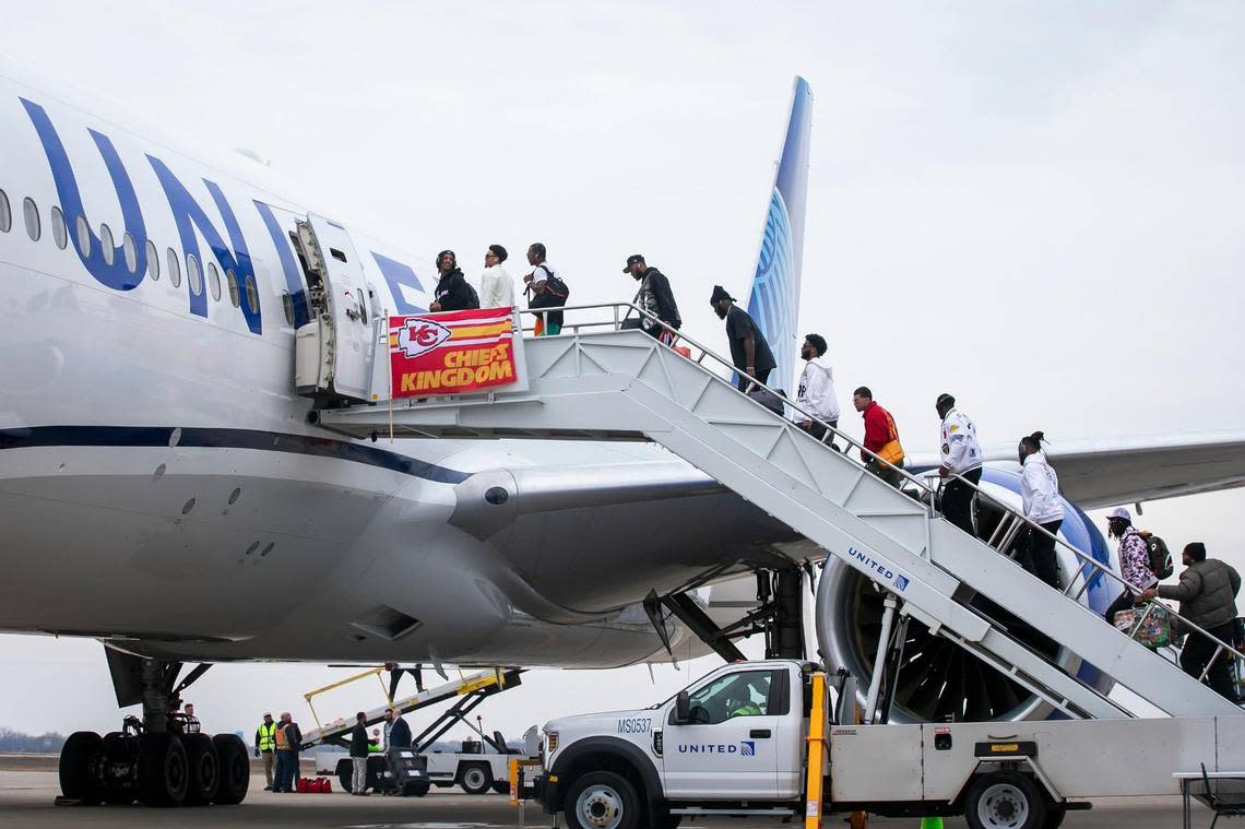 Members of the Kansas City Chiefs board a chartered United flight on their way to Las Vegas for Super Bowl LVIII on Sunday February 4, 2024 at KCI Airport in Kansas City, Missouri.