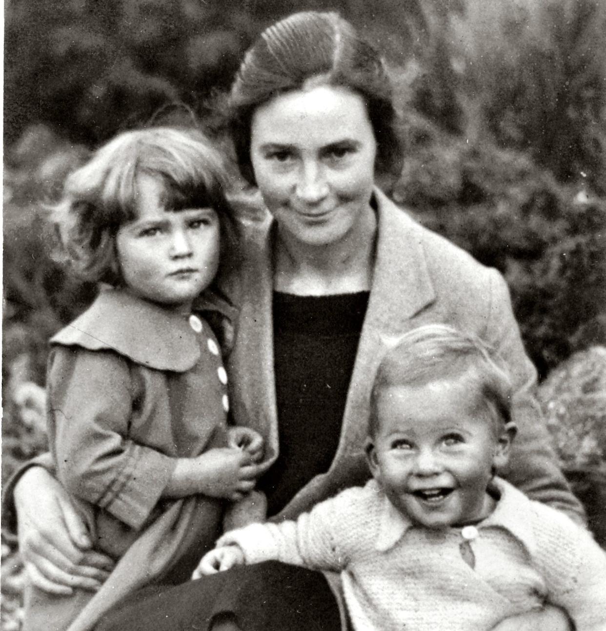 Roger Bannister aged around 18 months with mother Alice and sister Joyce, three, around 1930