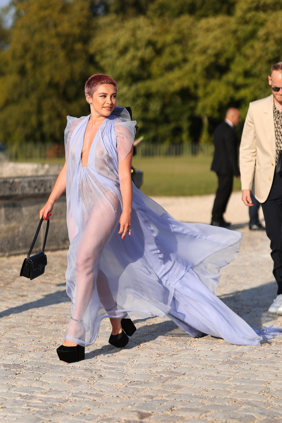 Florence Pugh attends the Valentino Haute Couture Fall/Winter 2023/2024 show in another sheer dress. (Getty Images) 