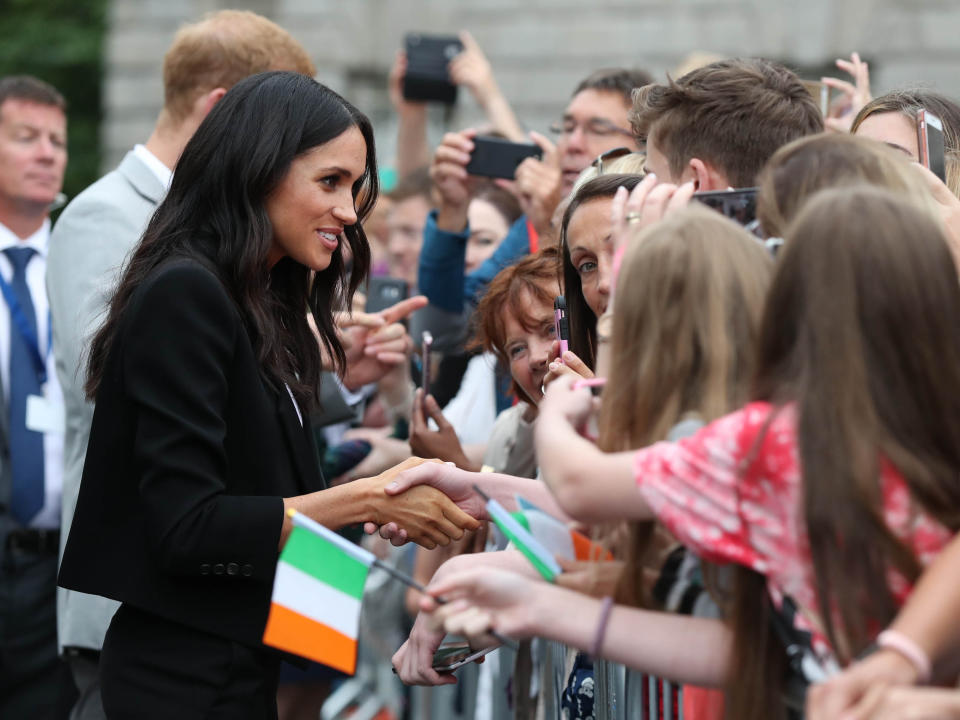 The Duchess of Sussex during her royal tour of Ireland with Prince Harry. [Photo: Getty]
