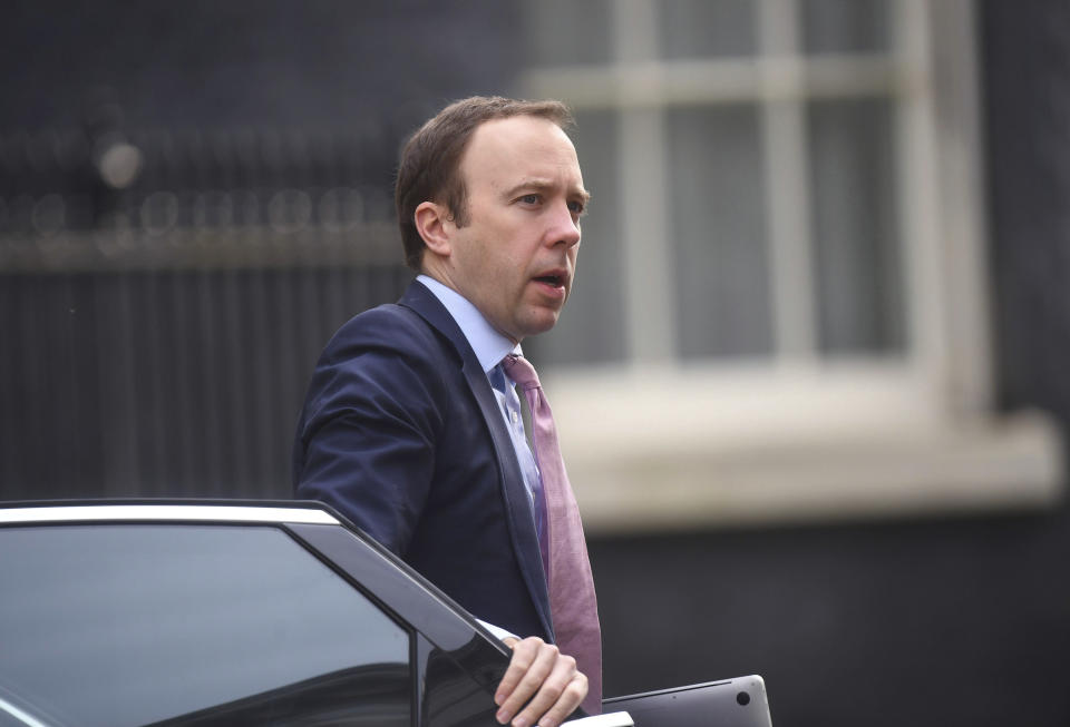 Britain's Health Secretary Matt Hancock arrives in Downing Street, London, Wednesday April 8, 2020. Prime Minister Boris Johnson has spent his second night in hospital intensive care unit for treatment after he contracted COVID-19 coronavirus. The highly contagious COVID-19 coronavirus has impacted on nations around the globe, many imposing self isolation and exercising social distancing when people move from their homes. (Victoria Jones / PA via AP)