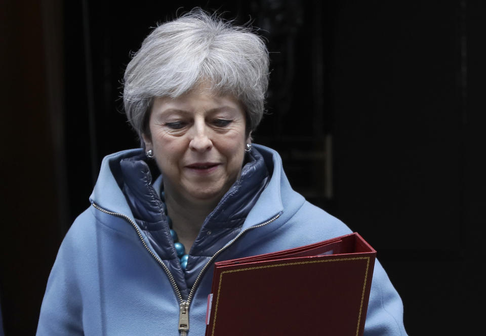 Britain's Prime Minister Theresa May leaves 10 Downing Street in London, Monday, March 25, 2019. Embattled Prime Minister Theresa May was scrambling Sunday to win over adversaries to her Brexit withdrawal plan as key Cabinet ministers denied media reports that they were plotting to oust her. (AP Photo/Kirsty Wigglesworth)