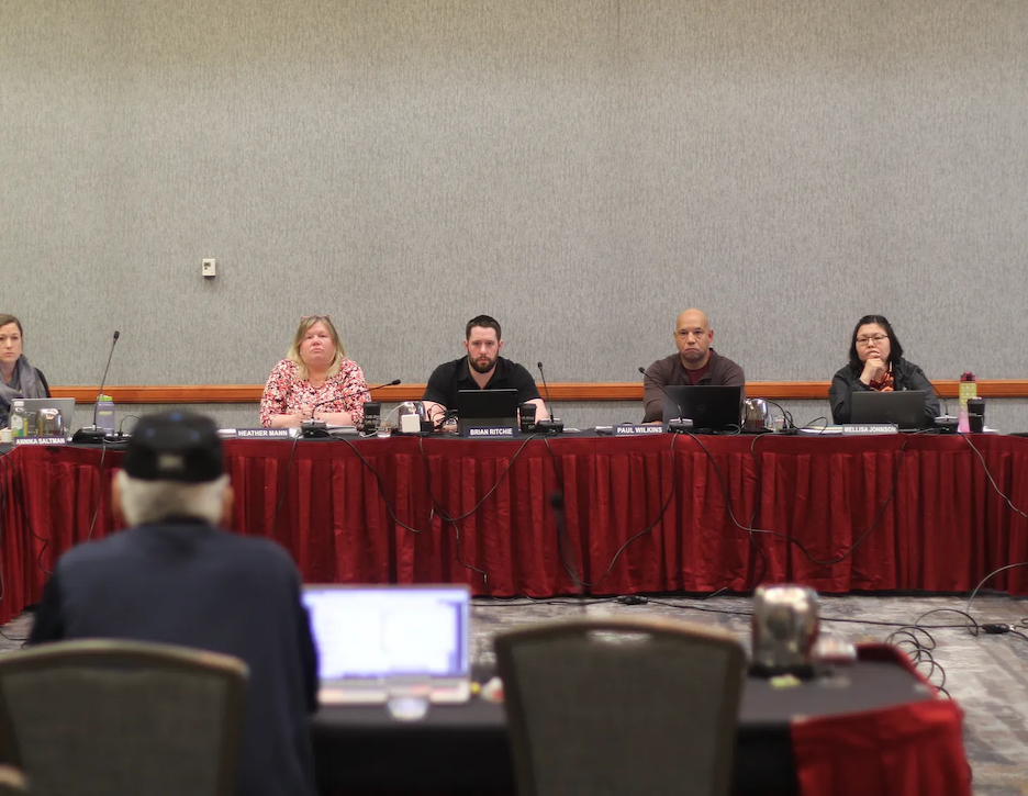 Members of the North Pacific Fishery Management Council’s advisory panel listen to testimony from a tribal leader in Anchorage this week. (Photo by Nathaniel Herz/Northern Journal)