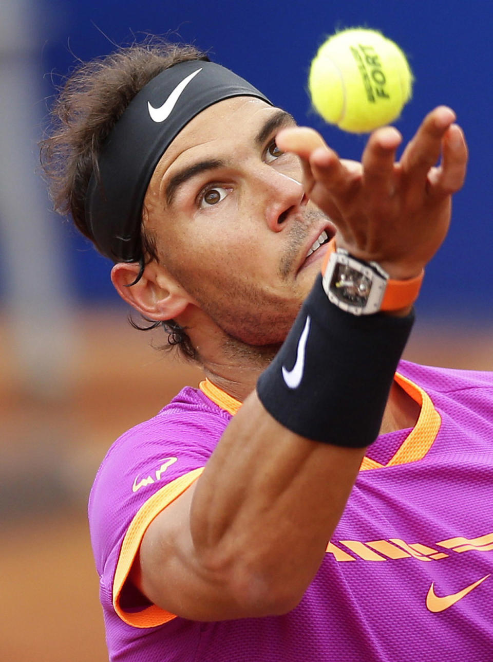 Rafael Nadal tosses ball to serve