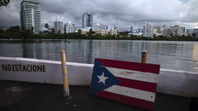 A wooden Puerto Rican flag is displayed on the dock of the Condado lagoon in San Juan, Puerto Rico.