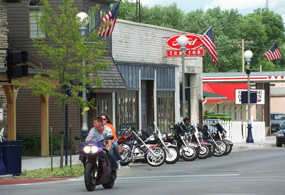 Motorcycles lined up in front of the National Motorcycle Museum in downtown Anamosa, Iowa, in 2004. The museum would move a few years later to a giant warehouse space on the outskirts of town.