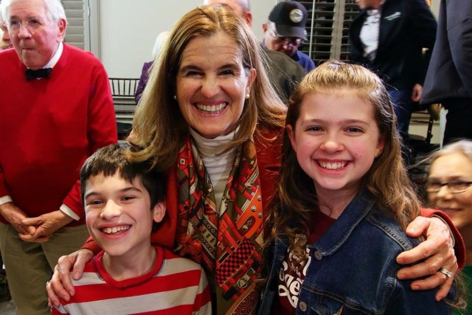 Hannah Kesselring and Adam Grossman pose with Mary Pat Christie, wife of former 2024 GOP contender Chris Christie.