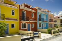 <p>Crisp and bright like the Punta Cana sun, these colorful stucco buildings will make you smile.</p>